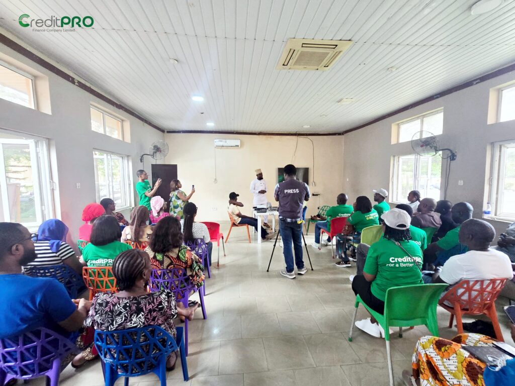 people sitting in a hall